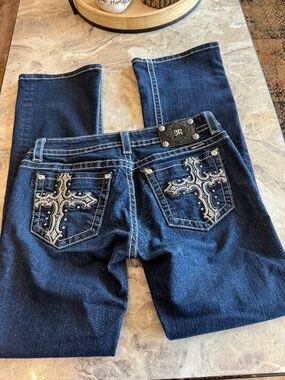 Miss Me dark blue rhinestone cross pocket denim boot, cut jeans